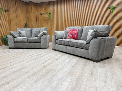 Side view of the 'Harvey' sofa, highlighting the deep seat base and contemporary shape of the armrest.