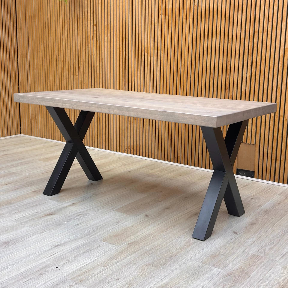 Lifestyle Industrial Bodahl Terra 8 dining table set in a modern dining room with matching chairs and grey oak finish.