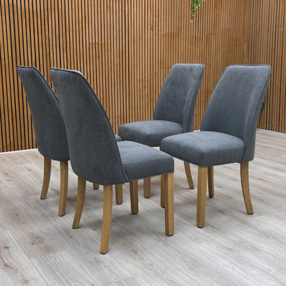 Frontal view of the 'Hamilton' charcoal grey dining chair, showcasing the comfortable seat and clean, modern lines.
