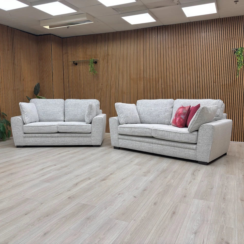 Side profile of the Chalfont Grey Sofa, emphasizing the deep, comfortable seat and the sleek outline of the sloped armrests.