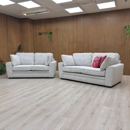 Side profile of the Chalfont Grey Sofa, emphasizing the deep, comfortable seat and the sleek outline of the sloped armrests.