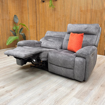 Angled view highlighting the body-hugging design and luxurious, fixed pocket spring seat cushions.