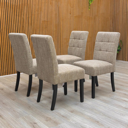 Lifestyle shot of a single 'Akita' chair, showing the elegant backrest and sturdy wooden legs.
