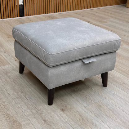 A high-quality photo of the footstool, potentially with other furniture, emphasizing its size and color in a staged setting.