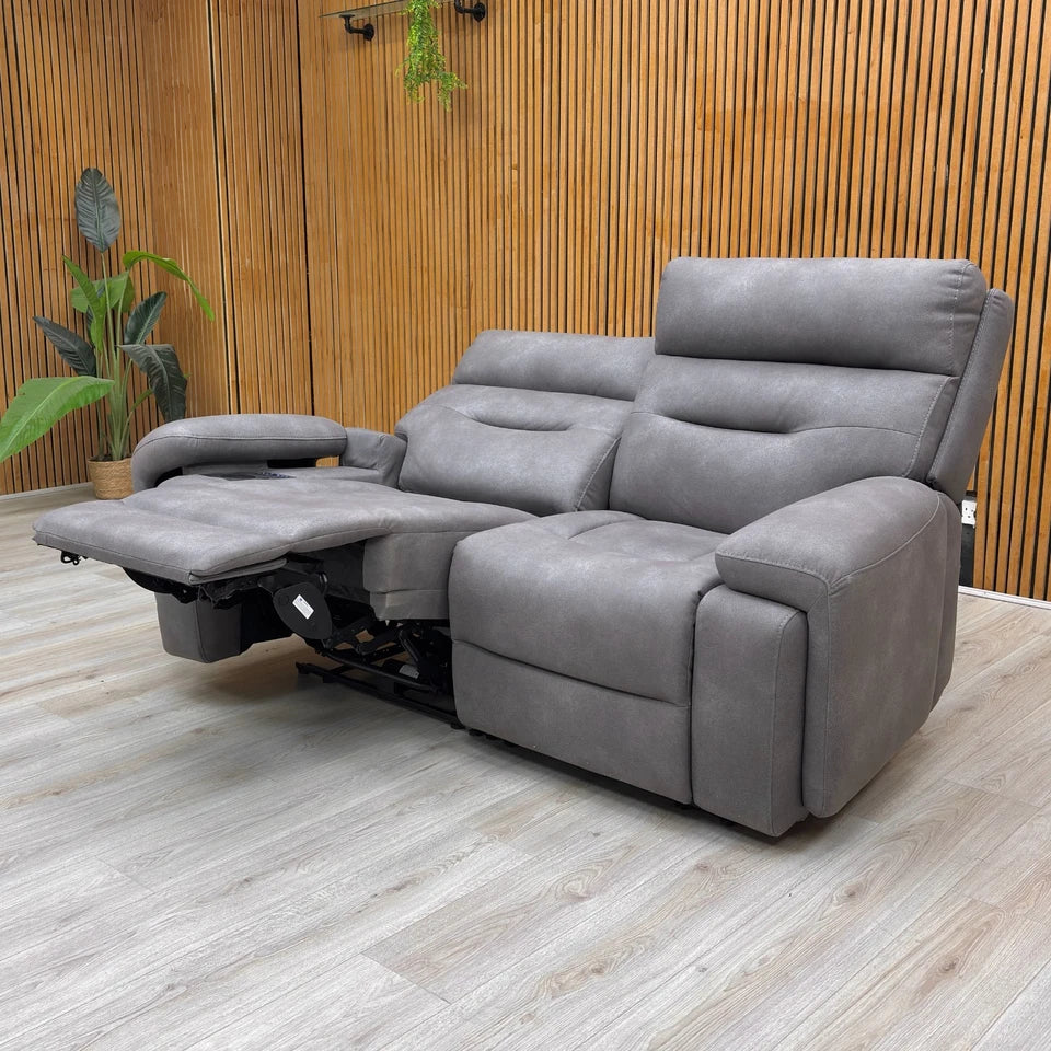 Angled view of the Cinemax Nappa Grey 2 Seater Power Recliner Sofa with one seat reclined.