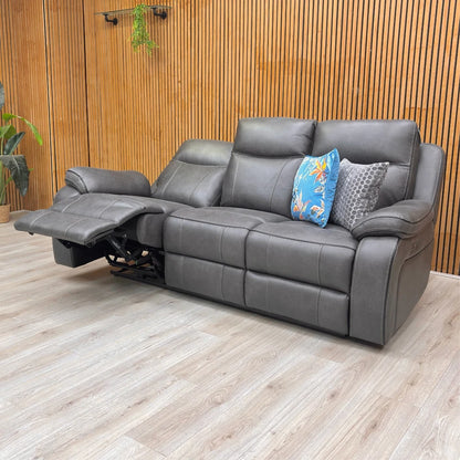 Lifestyle image of the 'Vinson' Graphite Grey Power Recliner Sofa in a modern living room setting.