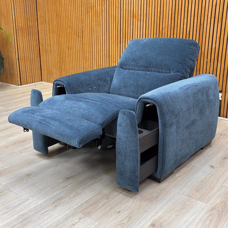 Full view of the Steel Blue Velvet Recliner Armchair with high back and plump cushions.