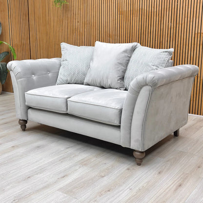 Lifestyle shot of the ‘Milton' Plush Silver Sensual Velvet Scatter Back 2 Seater Sofa.