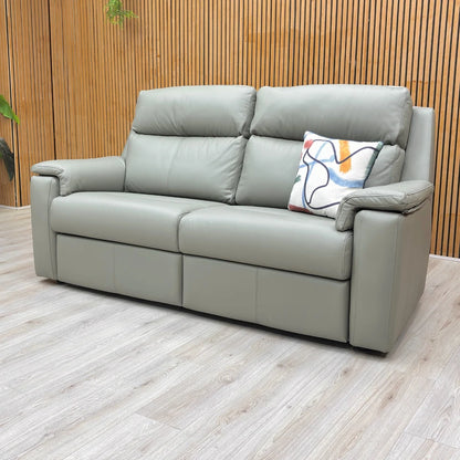 Lifestyle view of the olive leather sofa, illustrating how its traditional style fits into a modern living space.