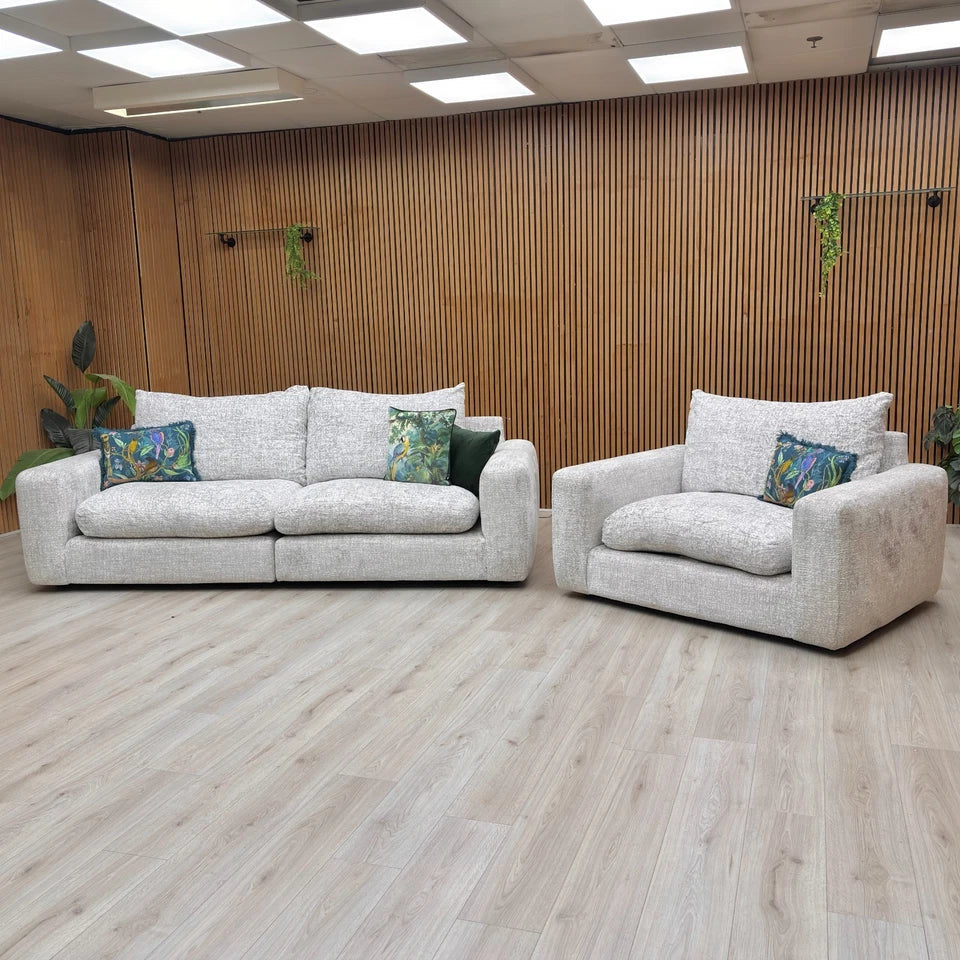 An image showing the Snuggler Chair, emphasizing its size for a single or cozy two-person seat.