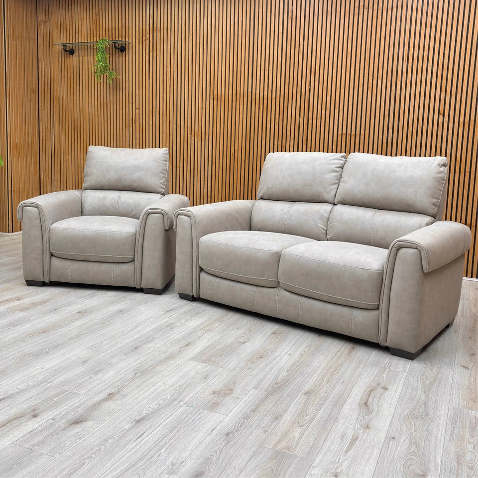 Full view of the Nixon Armchair in Marble Taupe Suede, showing its wide seat and high, supportive back.