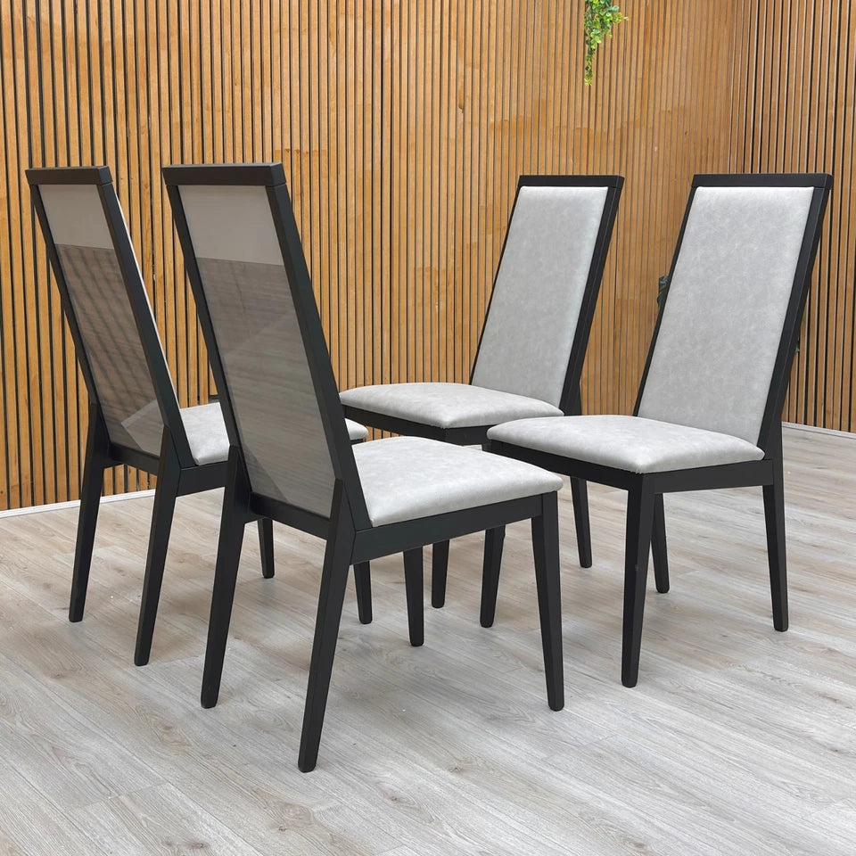 Life Style Image of a single ‘Movado’ chair, highlighting the sleek high-gloss finish and tall, elegant backrest.