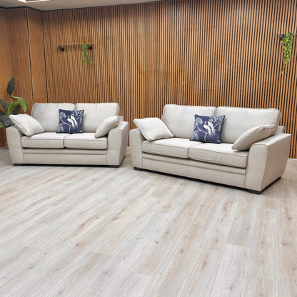 Front view of the 2 Seater Chalfont Sofa in Novak Biscuit tight weave fabric, emphasizing its compact size.