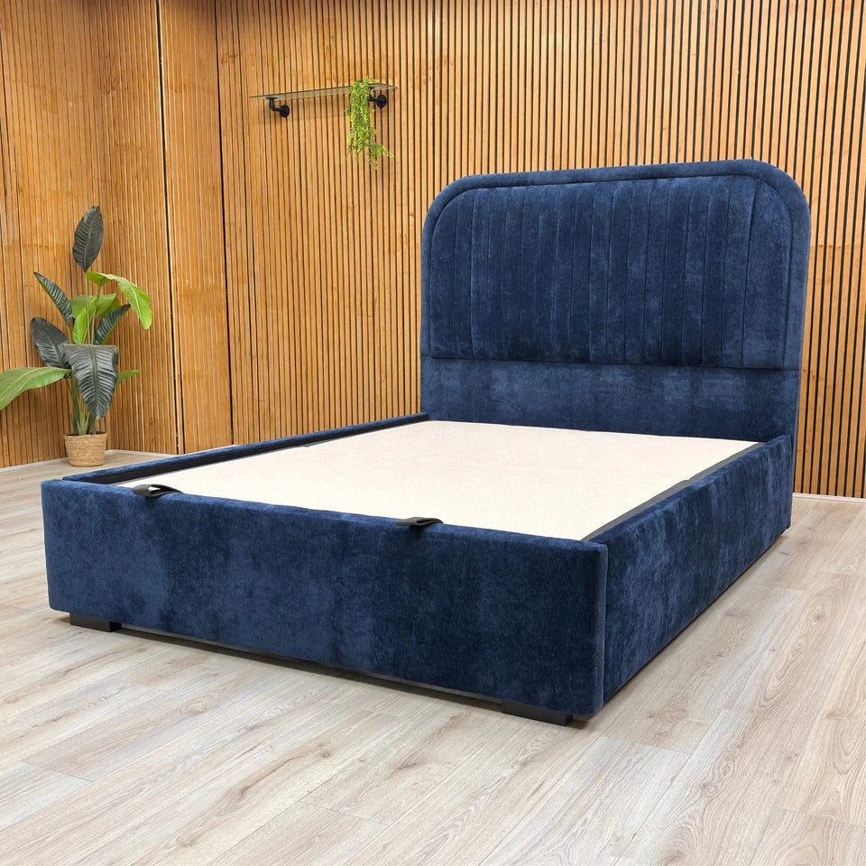 Lifestyle photo of the King-size 'Portland' Sapphire Fabric Bed in a room, highlighting the height and contemporary style of the headboard.