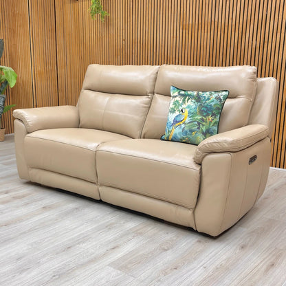 Lifestyle image of the 'Bobby' Cream Leather 3 Seater Sofa, showcasing its high-back, contemporary design.