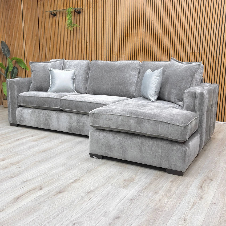 Lifestyle view of the 'Chelsea' sofa in a modern room setting, highlighting its spacious chaise section.