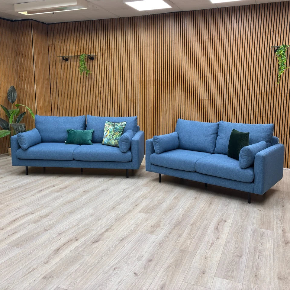 Angled view of the ‘Wren’ 3-Seater Sofa, highlighting the tailored look, sloped arms, and back cushion detailing.