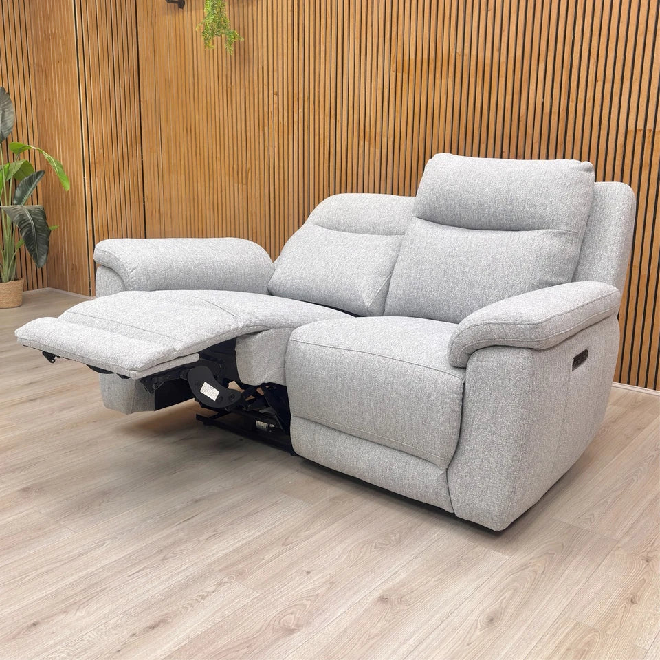 The Bobby Power Recliner Sofa shown in a reclined position, demonstrating the footrest extension for maximum comfort.