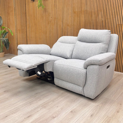 The Bobby Power Recliner Sofa shown in a reclined position, demonstrating the footrest extension for maximum comfort.
