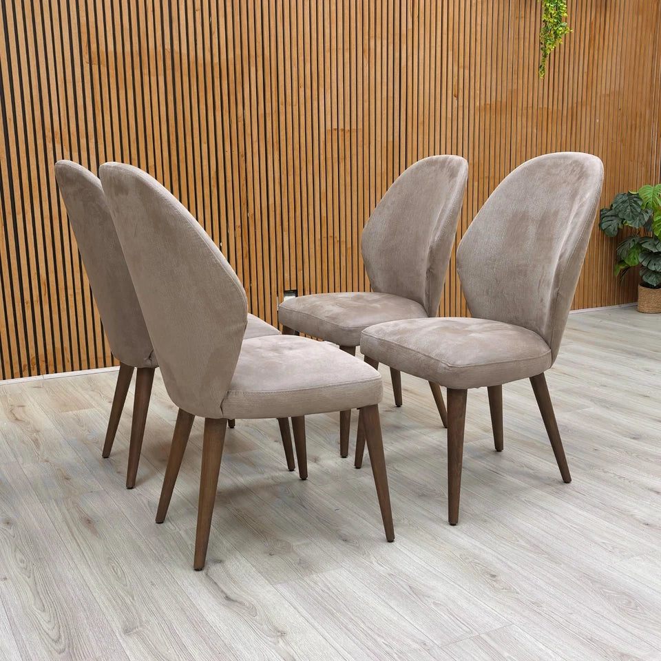 Rear angled view of the Stone International ‘Empire’ Dining Chair, confirming the fixed back design and slender wooden legs.