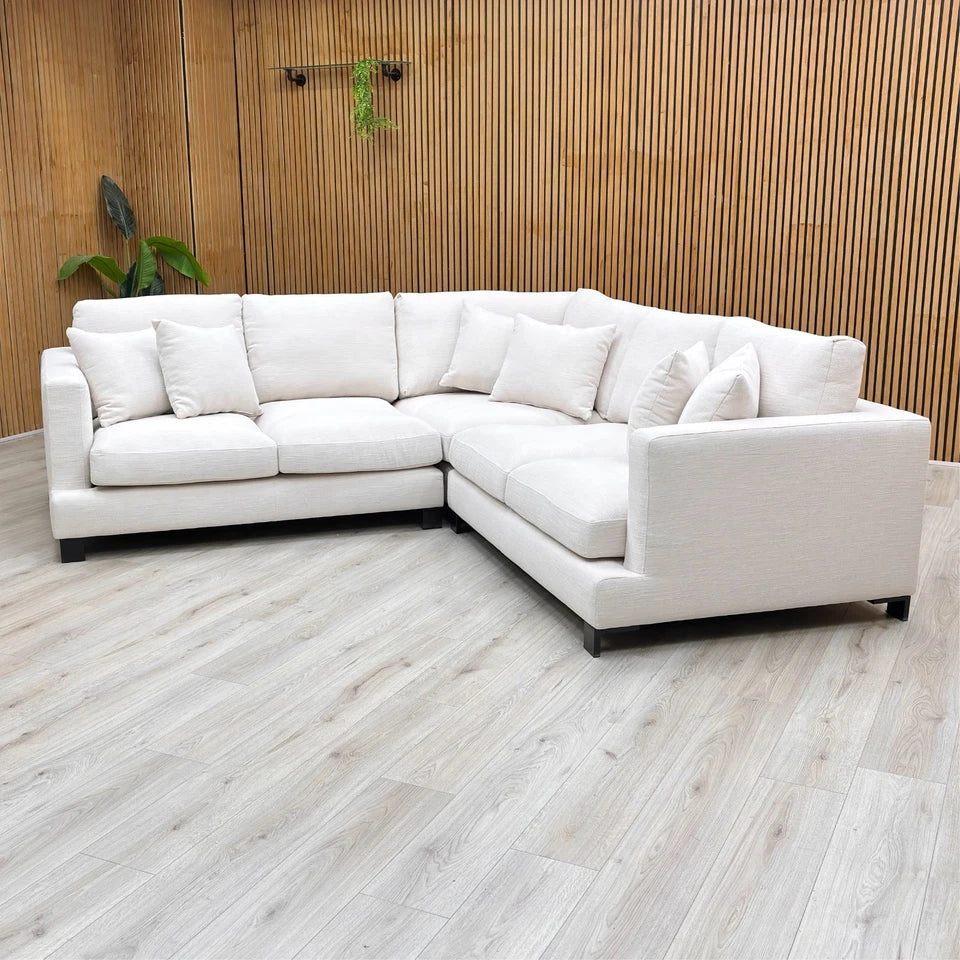 Lifestyle view of the sofa in a room setting, demonstrating its modern, minimalist appeal.