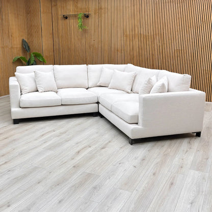 Lifestyle view of the sofa in a room setting, demonstrating its modern, minimalist appeal.