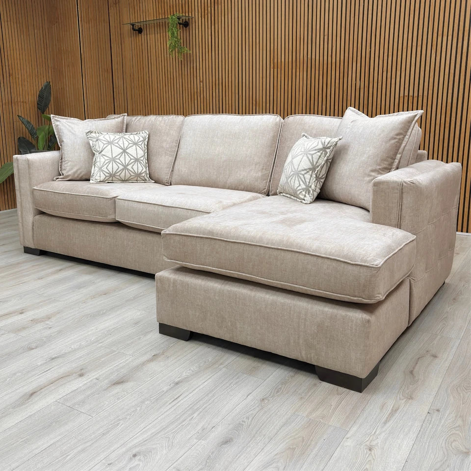 Overhead or high-angle view of the 'Chelsea' beige velvet corner chaise, clearly showing the L-shape configuration and the open-end design.