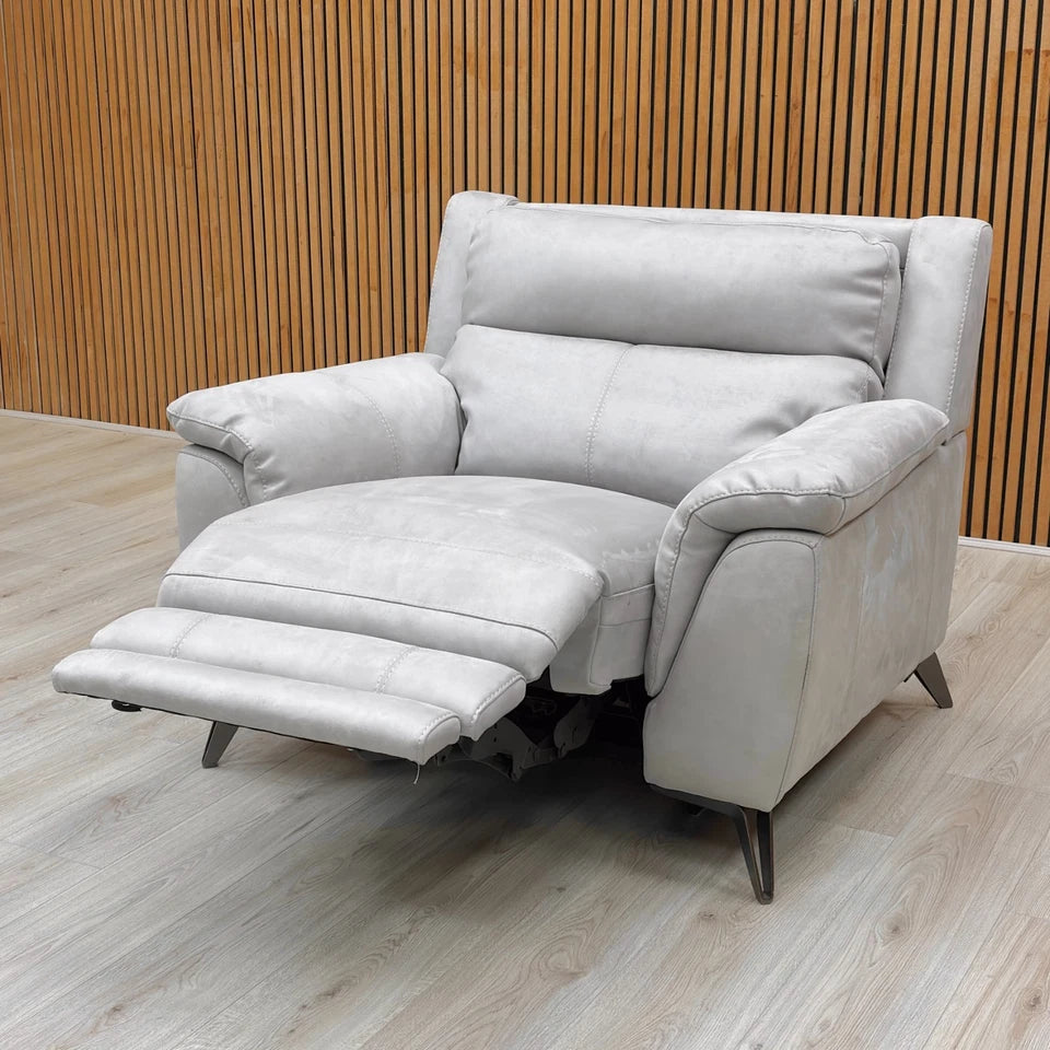The Contempo Recliner Armchair fully reclined in a room setting, highlighting its extended depth for full relaxation.