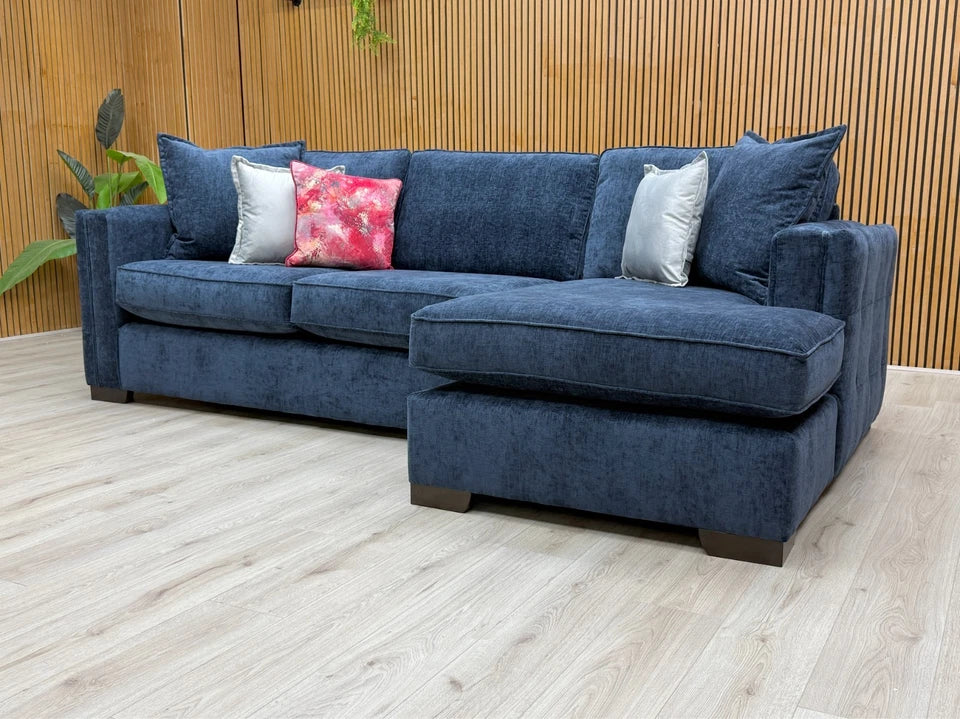 View of the open end of the chaise section and the shelter arm, showcasing the modern, low-profile design.