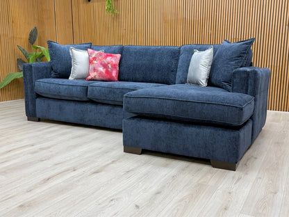 View of the open end of the chaise section and the shelter arm, showcasing the modern, low-profile design.