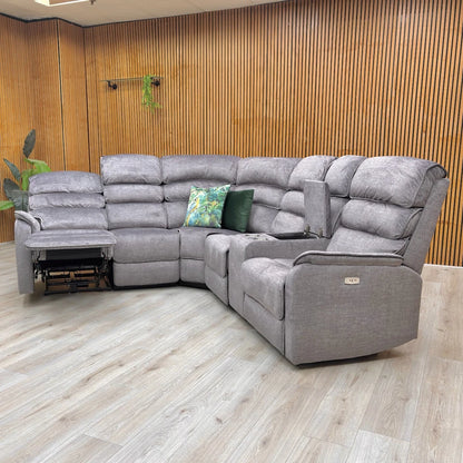 View of the sofa with one of the power recliners extended.