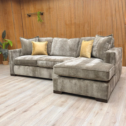 Studio shot of the ‘Chelsea' Sage Green Corner Chaise, illustrating the depth and large size.