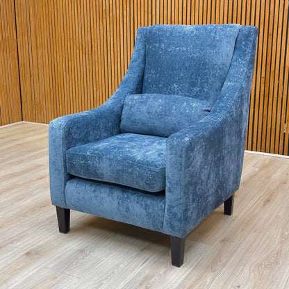 Lifestyle shot of the accent chair in a room setting.