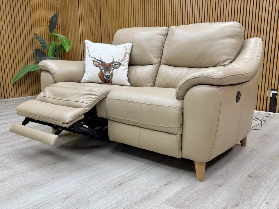 The 'Francis' cream leather power recliner sofa displayed in a typical living room setting.