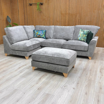 Full frontal view of the Legend Kingston Corner Sofa (278 cm wide) with its deep seating and soft, classic back cushions.