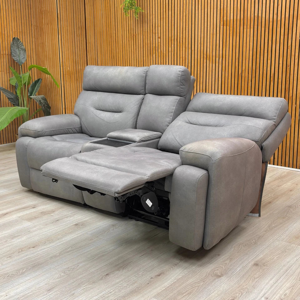 Angled view of the Nappa Grey Media Sofa, showing the integrated storage console or cupholders.