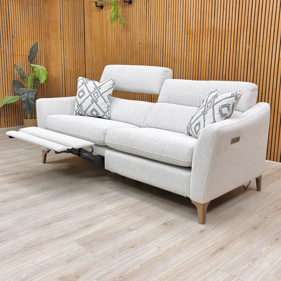 View of the sofa with the power recliner footrests extended.