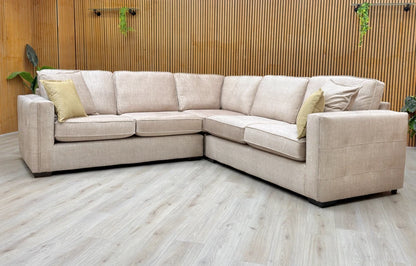 Detailed view of the modern English arm style and neat piping on the Chelsea sofa, illustrating the high-quality craftsmanship.