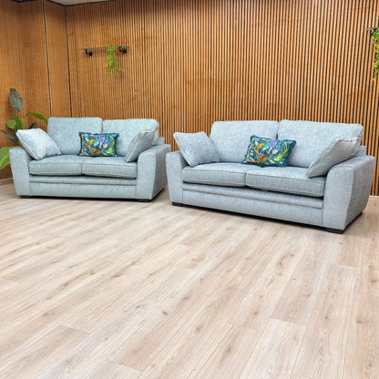 Side perspective of the 'Chalfont' 2-seater sofa, illustrating the sleek profile and sloped armrest design.