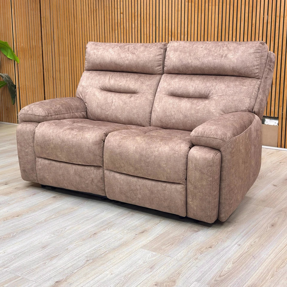 Lifestyle shot of the brown velvet sofa in a modern interior, showcasing its generous body-hugging curves and medium comfort design.