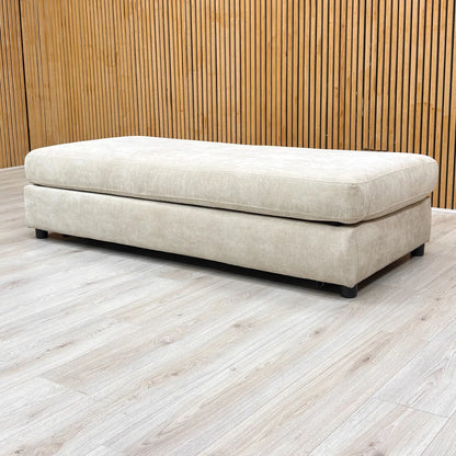 Lifestyle shot of the 'Esprit' stool in a contemporary room, showing its scale relative to other furniture.