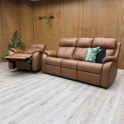 The G Plan Power Recliner Chair in a reclined position, highlighting the power headrest and power lumbar support features.