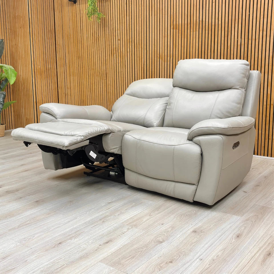 Detail shot of the New Grey Leather texture, highlighting the quality stitching and cushion filling (pocket springs).