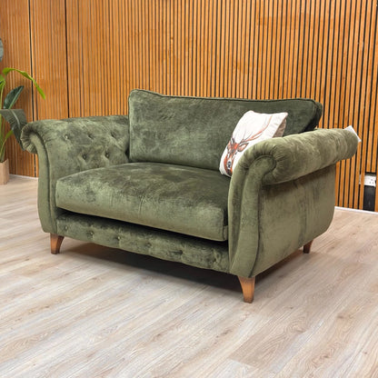 Boutique ‘Palace’ Snuggler Chair in Moss Fabric with a Classic Back is a luxurious addition to any living room