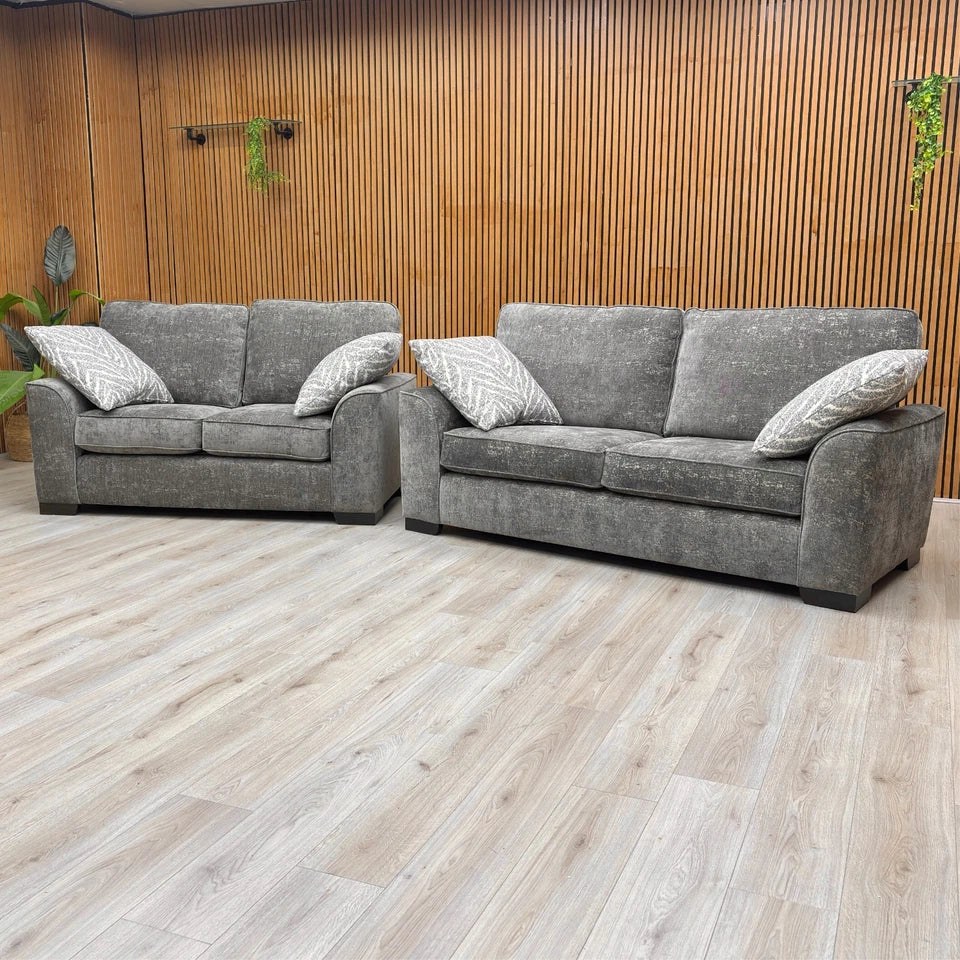 Lifestyle shot of the 'Theodore' Charcoal Grey Sofa Set highlighting the chenille fabric.