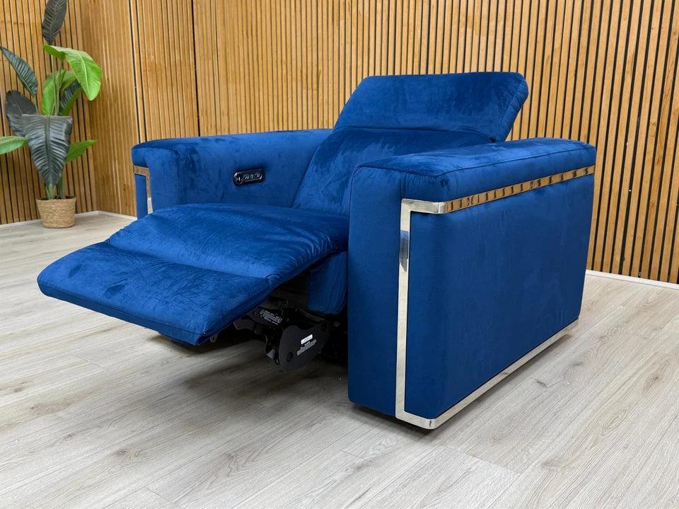 Lifestyle or alternative angled view of the 'Cora' Royal Blue Recliner Armchair in a contemporary setting.