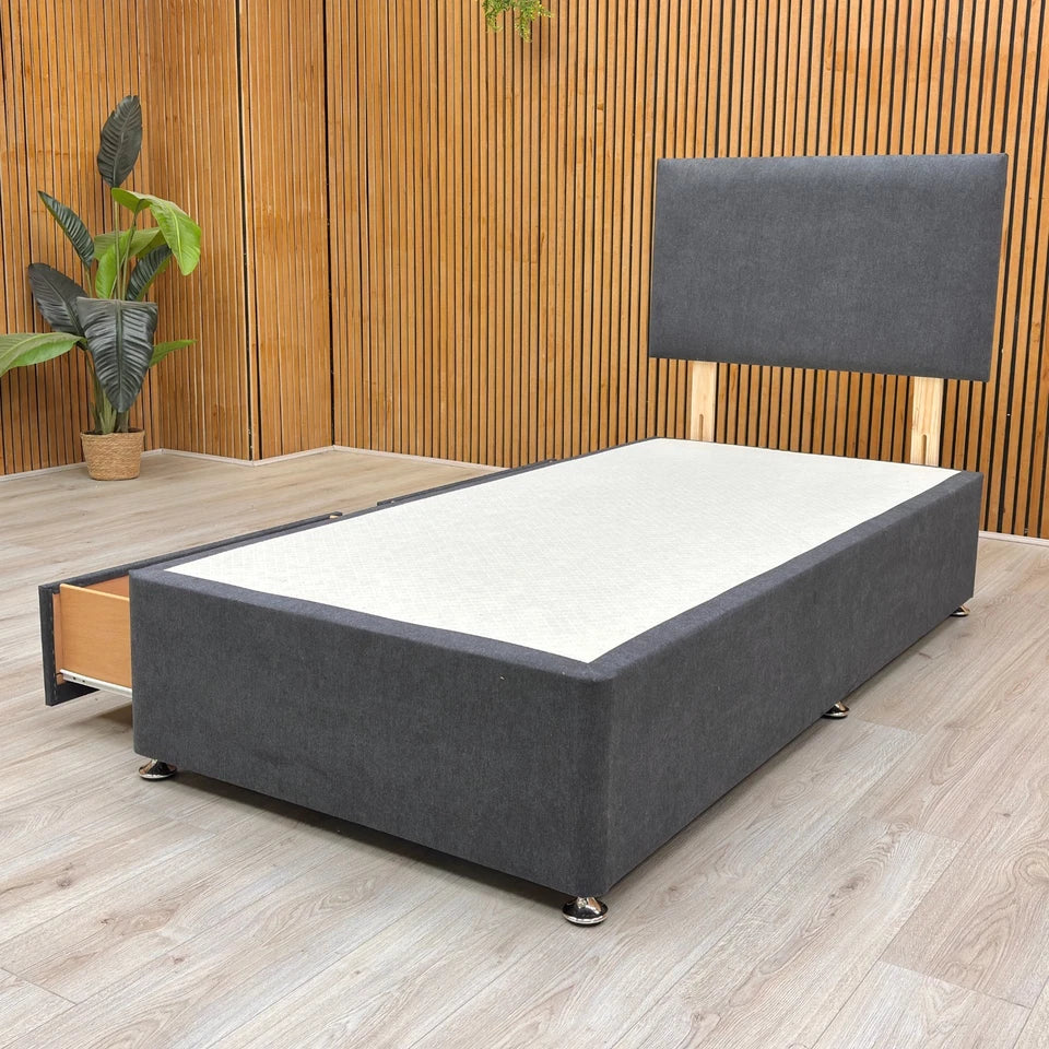 Lifestyle shot of the bed with a mattress and bedding.