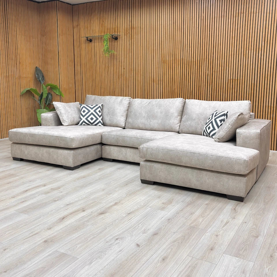 Lifestyle Shot showing the depth of the 160cm chaise end and the clean, modern lines of the sofa frame.
