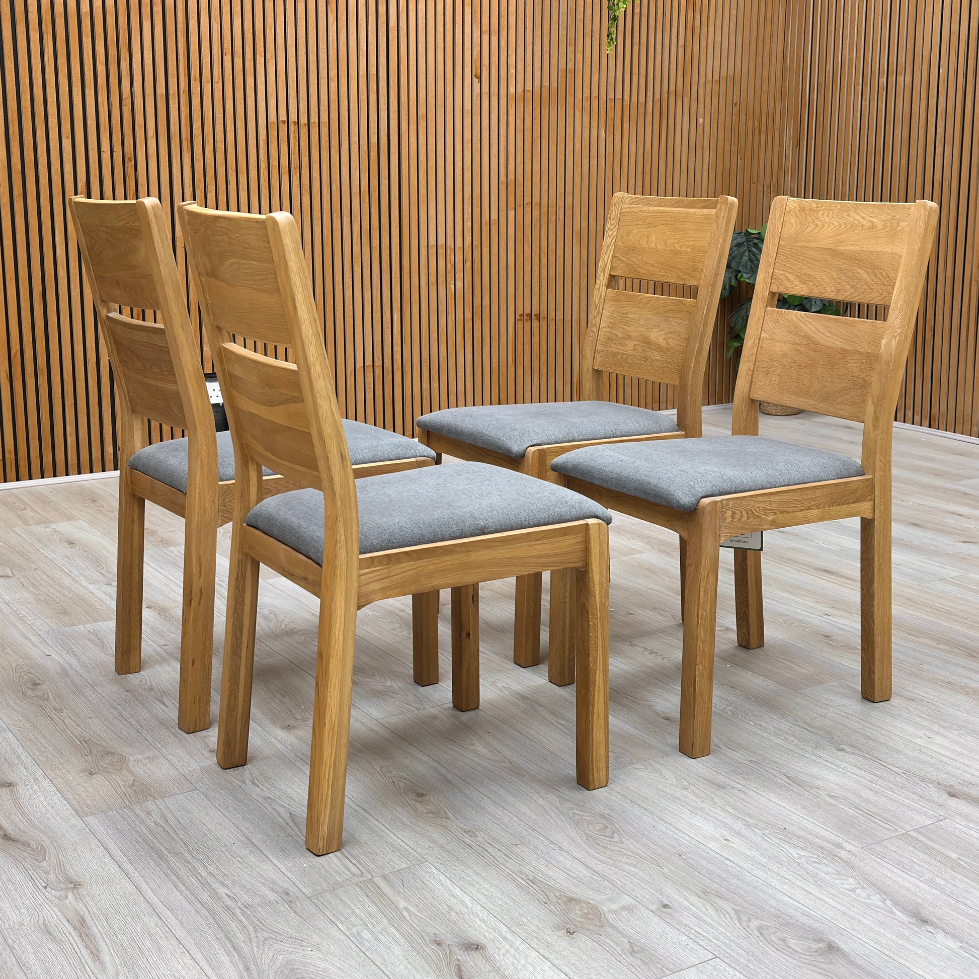 upholstered seat fabric and the junction with the dark wood frame on the 'Bakerloo' dining chair.